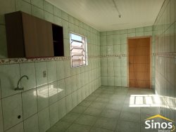 Terreno com 02 casas no bairro Rondônia 