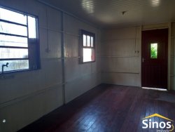 Terreno com 02 casas no bairro Rondônia 