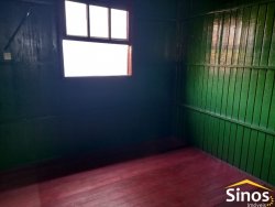 Terreno com 02 casas no bairro Rondônia 
