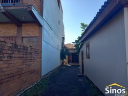 Terreno com 02 casas no bairro Rondônia 