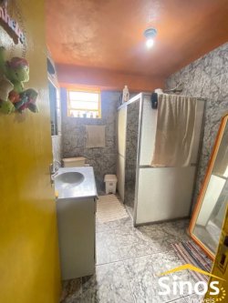 Casa com salas comerciais no bairro Ideal 