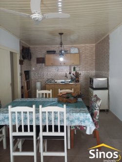 Casa mobiliada com 03 dormitórios no bairro Jardim América 