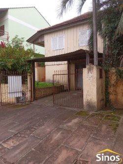 Terreno com 02 chalés no Bairro Jardim Mauá 
