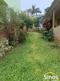 Terreno com 02 chalés no Bairro Jardim Mauá 