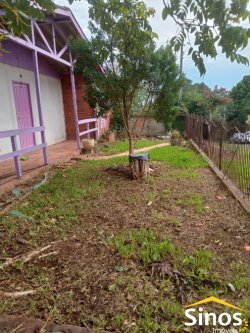 Terreno com casa no bairro Feitoria  
