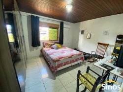 Casa com 04 dormitórios no Bairro Rio dos Sinos 