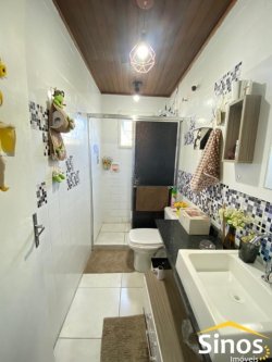 Casa com 04 dormitórios no Bairro Rio dos Sinos 