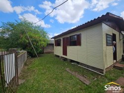 Terreno com 02 casas no Bairro Santo Afonso 
