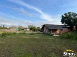 Amplo terreno com Prédio Comercial em Lomba Grande 