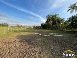 Amplo terreno com Prédio Comercial em Lomba Grande 