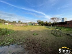Amplo terreno com Prédio Comercial em Lomba Grande 