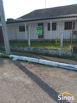 Terreno de esquina com casa no bairro Canudos 