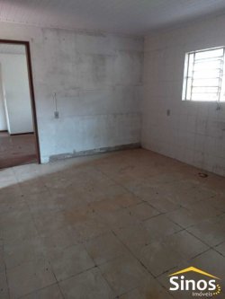 Terreno de esquina com casa no bairro Canudos 