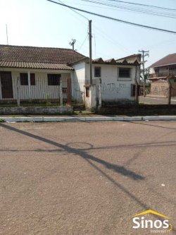 Terreno de esquina com casa no bairro Canudos 