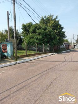 Terreno de esquina com casa no bairro Canudos 
