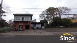 Terreno plano com construção de 1.500 m² 