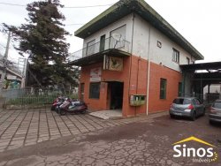 Terreno plano com construção de 1.500 m² 