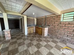 Linda casa na área central de Lomba Grande 