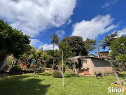 Terreno de esquina com casa no bairro Vila Nova 