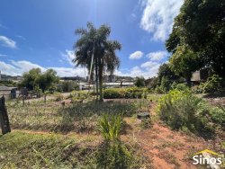 Terreno de esquina com casa no bairro Vila Nova 