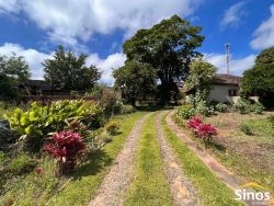 Terreno de esquina com casa no bairro Vila Nova 