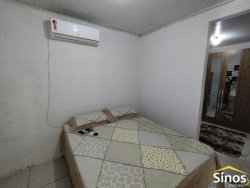 Casa com sala comercial no bairro Boa Saúde  