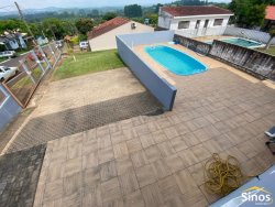 Casa com 03 dormitórios em Lomba Grande 