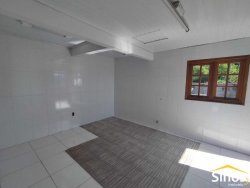 Casa com 03 dormitórios no bairro Vila Nova 