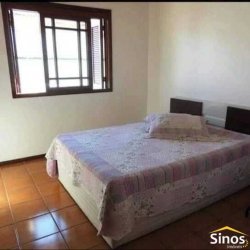 Casa com 03 dormitórios no bairro Vila Progresso 