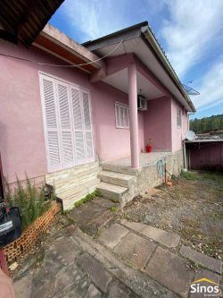 Terreno com 02 casas no bairro Panorâmico 