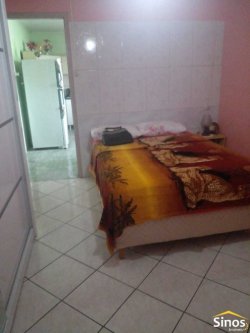 Terreno com 02 casas no bairro Panorâmico 
