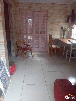 Terreno com 02 casas no bairro Panorâmico 