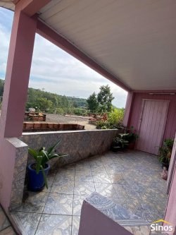 Terreno com 02 casas no bairro Panorâmico 