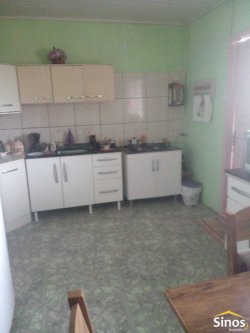 Terreno com 02 casas no bairro Panorâmico 