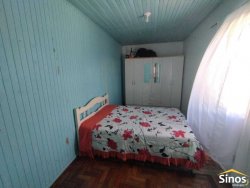 Terreno com duas casas no bairro Vila Nova 