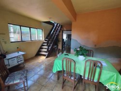 Terreno com duas casas no bairro Vila Nova 