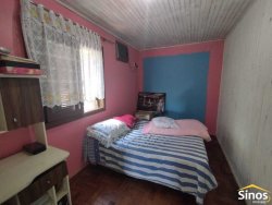 Terreno com duas casas no bairro Vila Nova 
