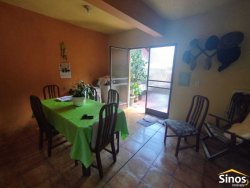 Terreno com duas casas no bairro Vila Nova 