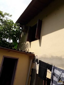 Terreno com duas casas no bairro Vila Nova 