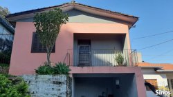 Terreno com duas casas no bairro Vila Nova 