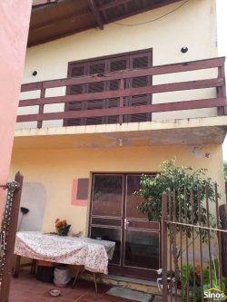 Terreno com duas casas no bairro Vila Nova 