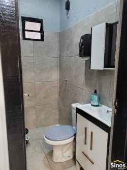 Casa com sala comercial no bairro Vila Nova 