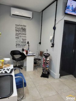 Casa com sala comercial no bairro Vila Nova 