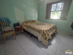 Casa com 03 dormitórios no Bairro Jardim Luciana 