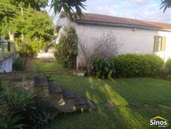 Terreno de esquina com casa no bairro Vila Nova 