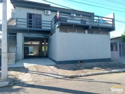 Pavilhão com casa no bairro Liberdade  