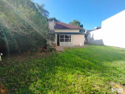 Terreno de 1.100m² com casa antiga no bairro Liberdade 