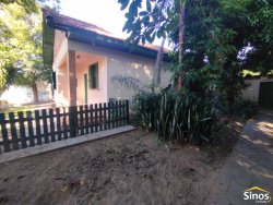 Terreno de 1.100m² com casa antiga no bairro Liberdade 