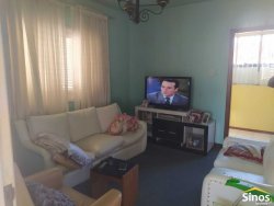 Prédio comercial com casa no bairro Ideal 