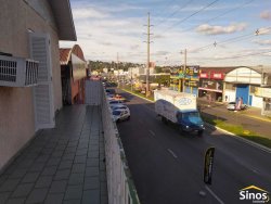 Prédio comercial com casa no bairro Ideal 